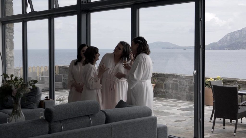 bride and bridesmaids champagne in rathmullan wedding morning dressing gowns