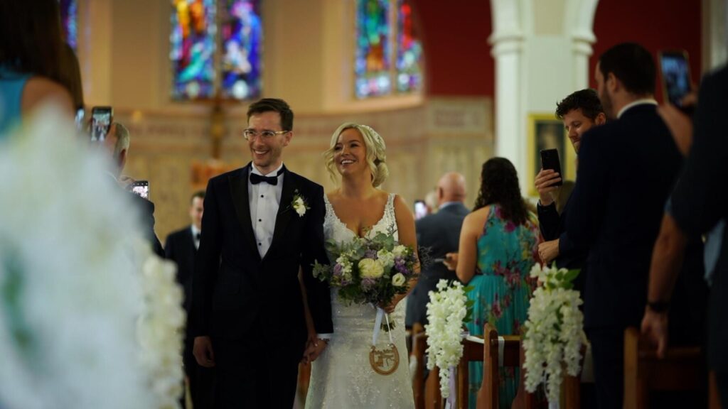 bride and groom walk the aisle in gortahork