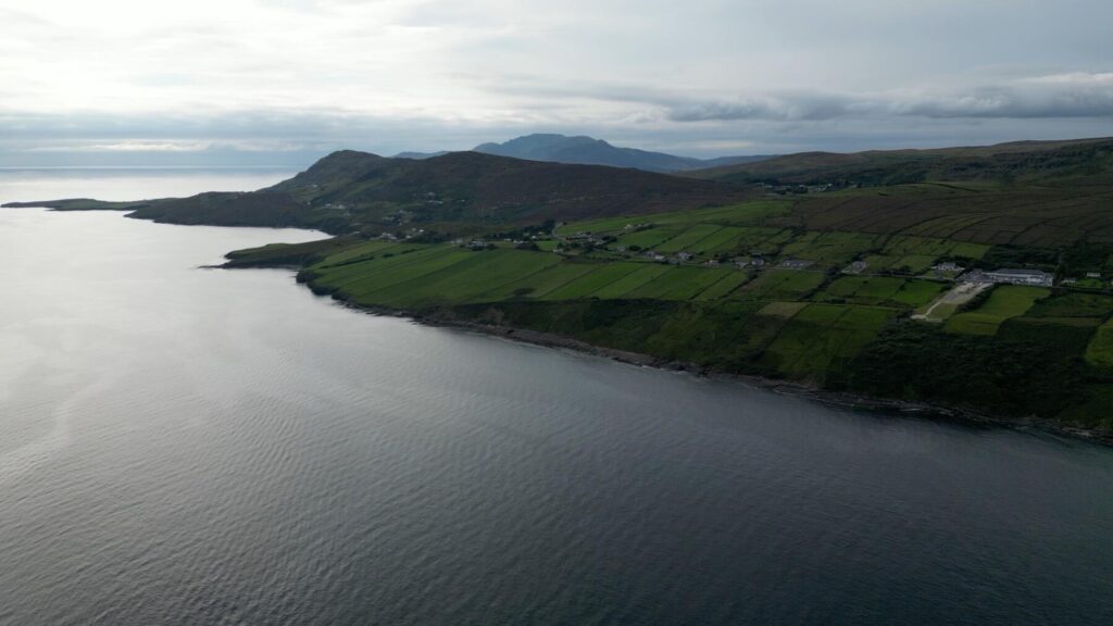 Blue Haven aerial drone shot with Sliabh Liag Cliffs in the background Wedding Video Highlight Film