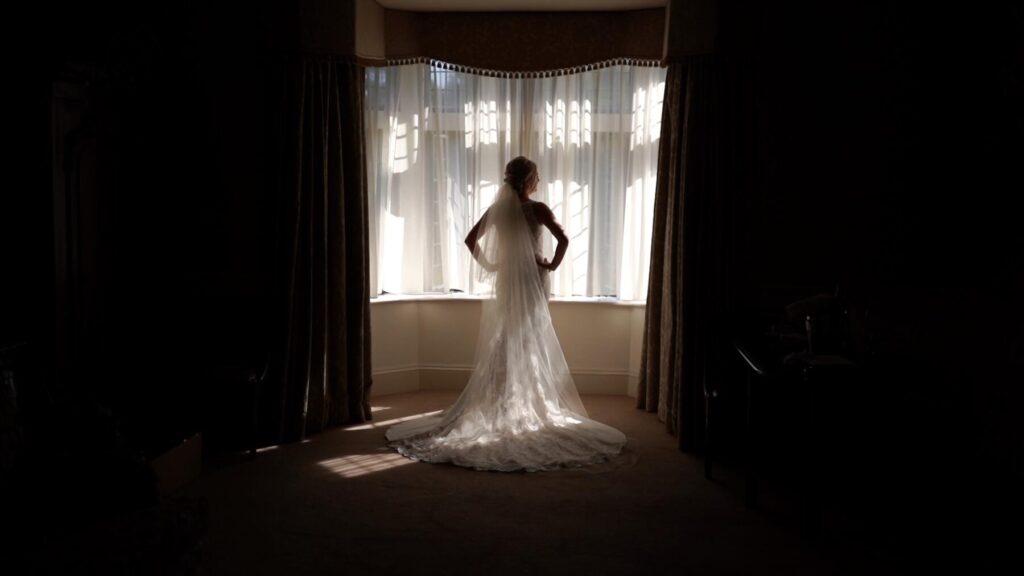 before the outdoor ceremony in lough eske bride Elinor takes a moment