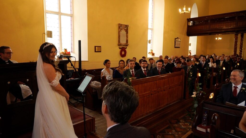 scene from wedding video as singing bride zara serenades groom michael