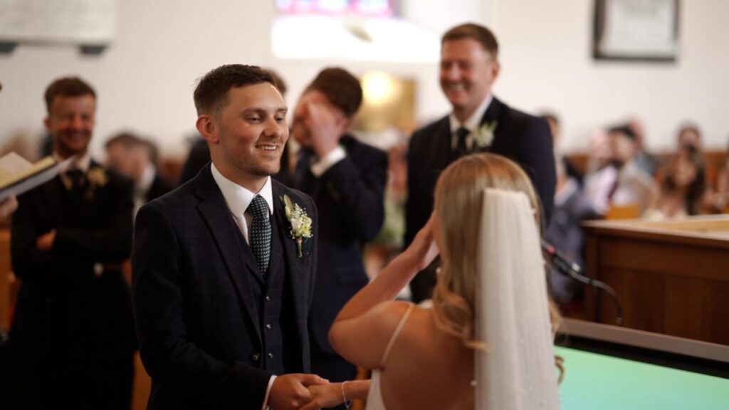 groom laughs at mistake in vows