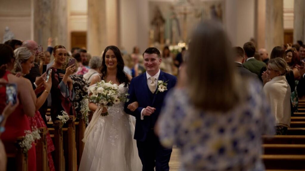 Just married! Roisin and Tommy walk down the aisle